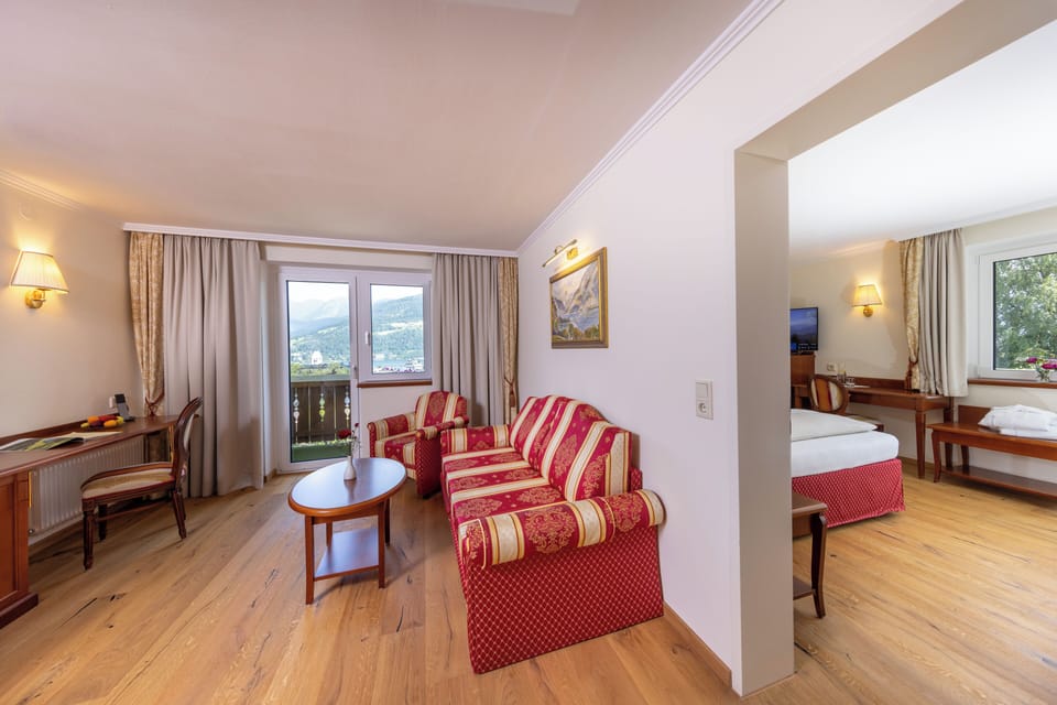 Suite, 1 Double Bed, Balcony, Lake View | Down comforters, minibar, in-room safe, desk