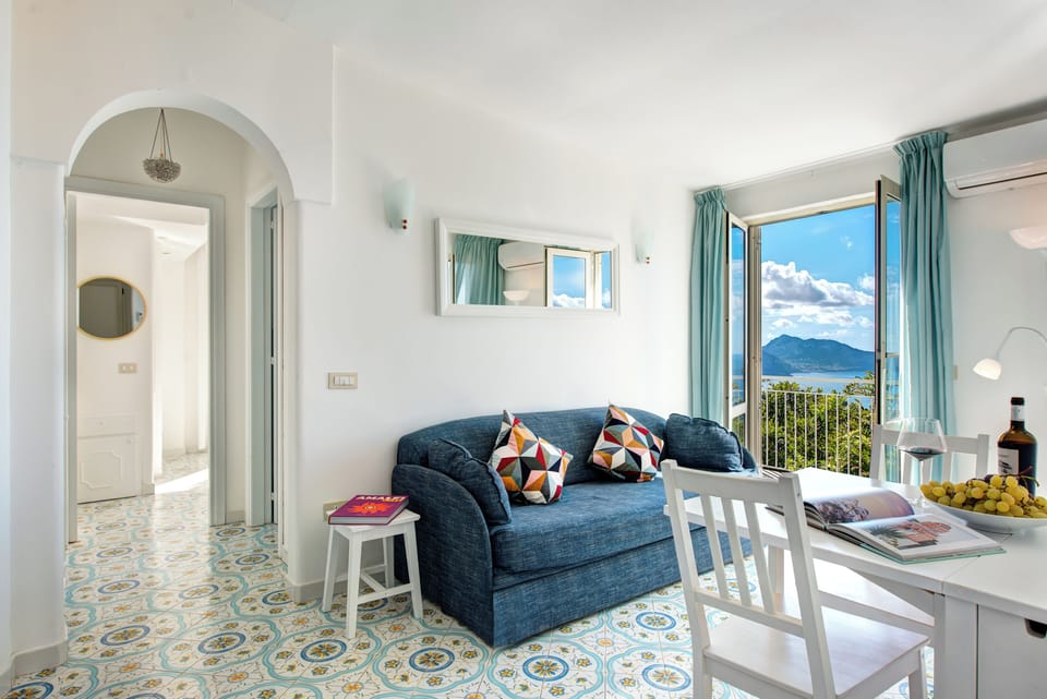 Deluxe Condo, 1 Bedroom, Sea View | Private kitchen | Espresso maker, coffee/tea maker, fridge, electric kettle