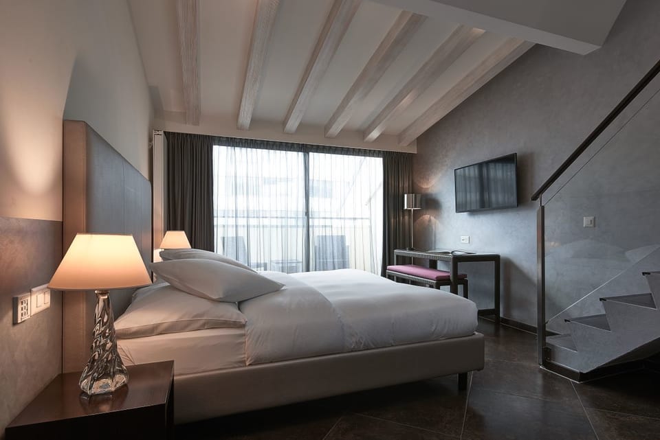 Duplex, Balcony | Minibar, in-room safe, desk, soundproofing