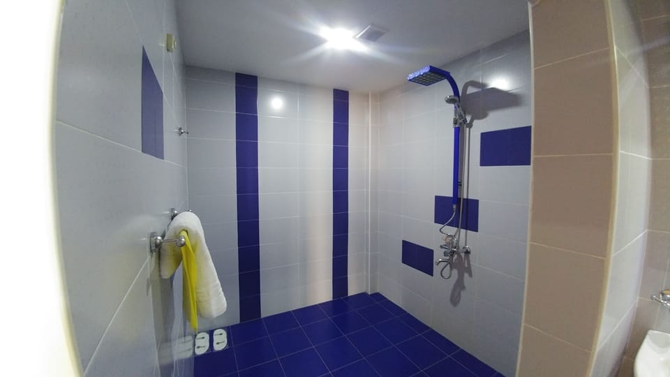 Deluxe Double Room, 1 Double Bed, Balcony | Bathroom | Shower, free toiletries, hair dryer, slippers
