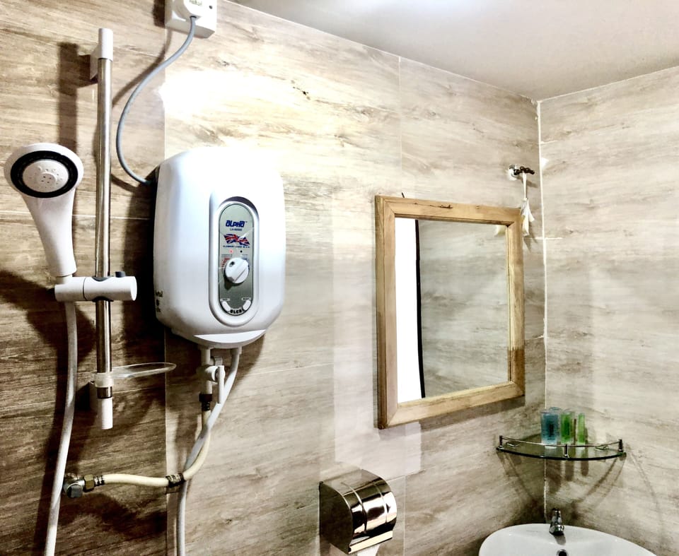 Shower, free toiletries, hair dryer, slippers