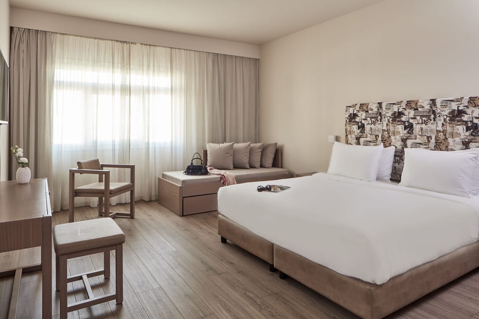 Free minibar, in-room safe, desk, laptop workspace