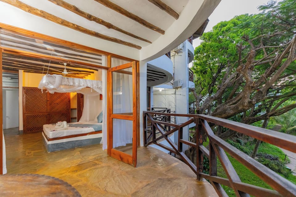 Standard Double Room, Garden View, Beachside | Bathroom | Shower, free toiletries, bidet, towels