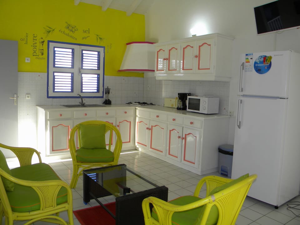 Apartment, 3 Bedrooms | Living area | Flat-screen TV