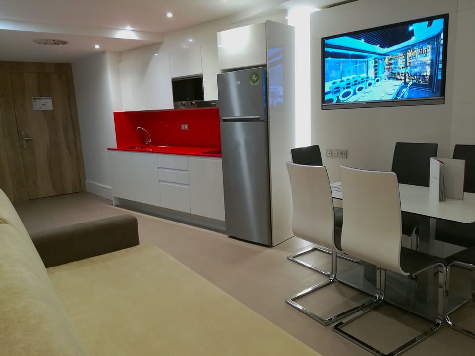 Family Room, 2 Bedrooms | Living area | 42-inch flat-screen TV with cable channels, TV