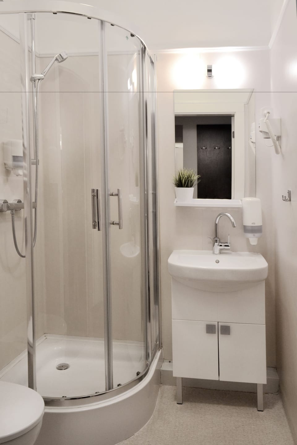 Shower, free toiletries, hair dryer, towels