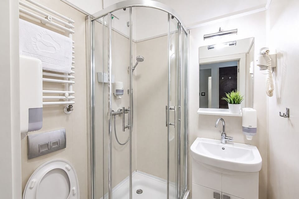 Shower, free toiletries, hair dryer, towels