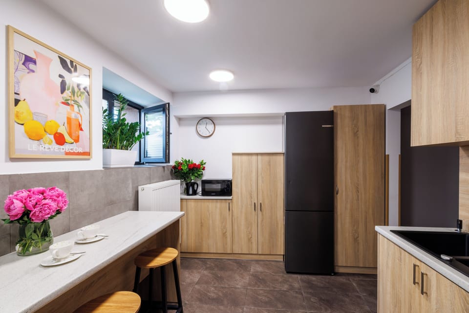 Fridge, microwave, electric kettle, cookware/dishes/utensils
