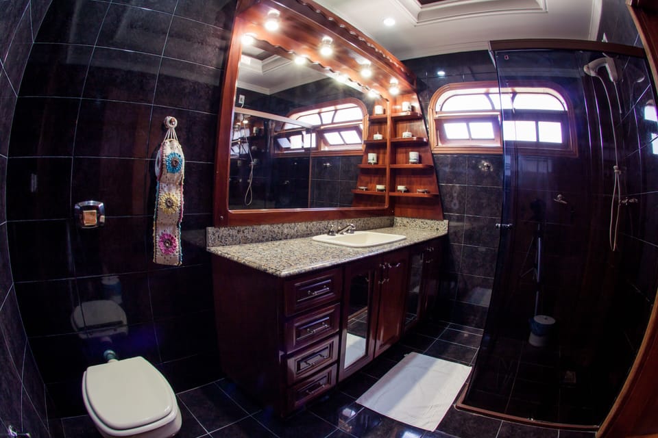 Economy Twin Room | Bathroom | Hair dryer, towels, soap, shampoo