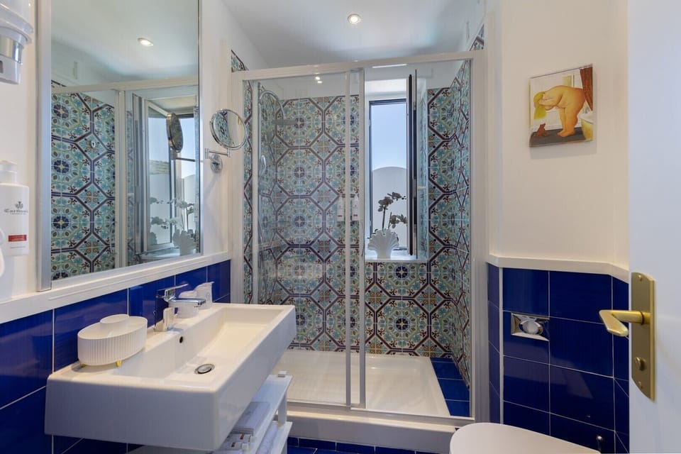 Panoramic Double Room, 1 Double Bed, Balcony, Sea View | Bathroom | Free toiletries, hair dryer, towels, soap