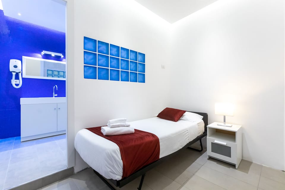 Family Quadruple Room | In-room safe, desk, soundproofing, iron/ironing board