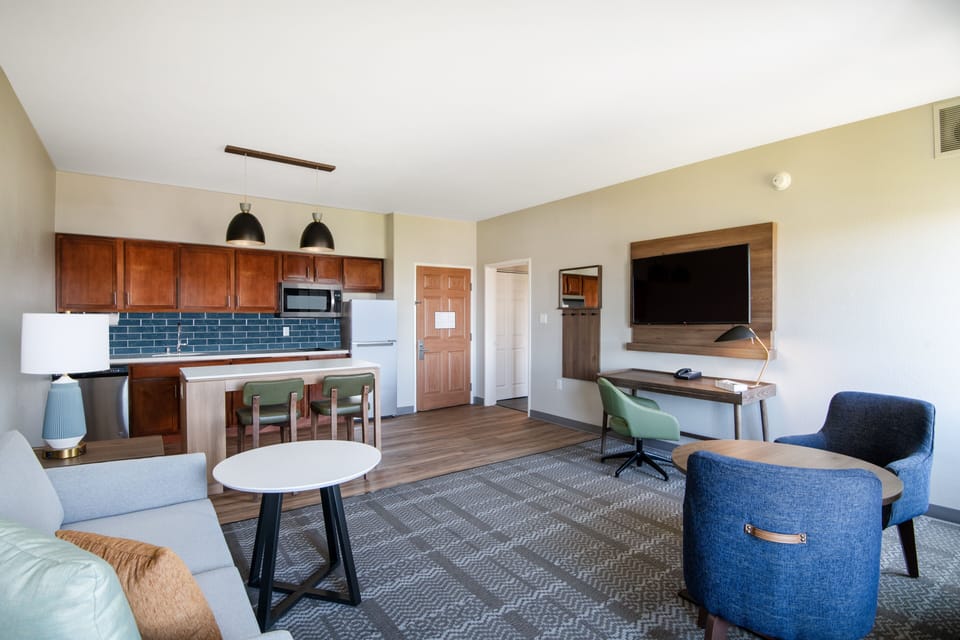 Suite, 1 Bedroom, Kitchen | Desk, laptop workspace, blackout drapes, iron/ironing board