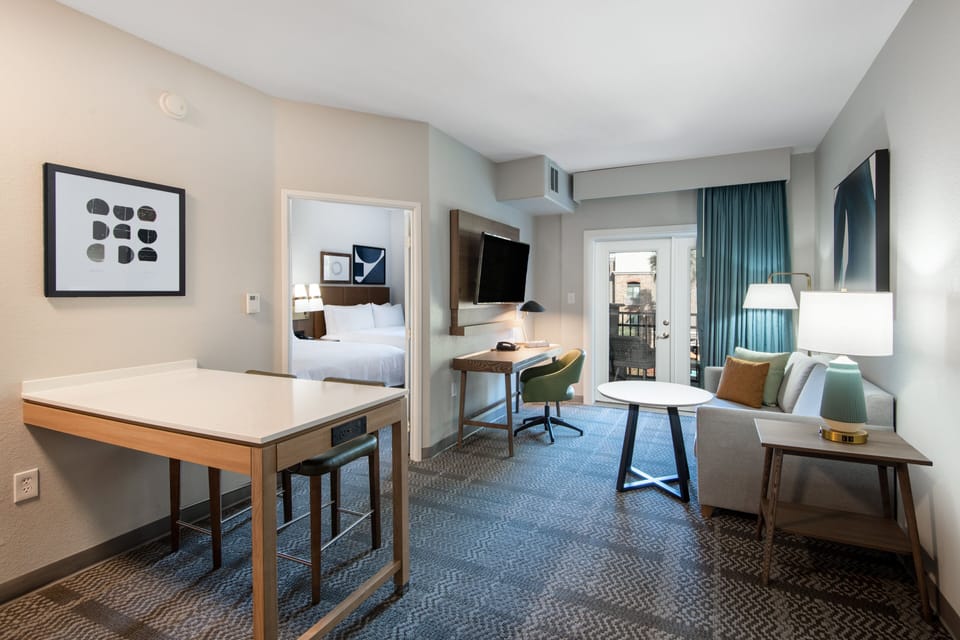 Suite, 1 Bedroom, Balcony | Desk, laptop workspace, blackout drapes, iron/ironing board