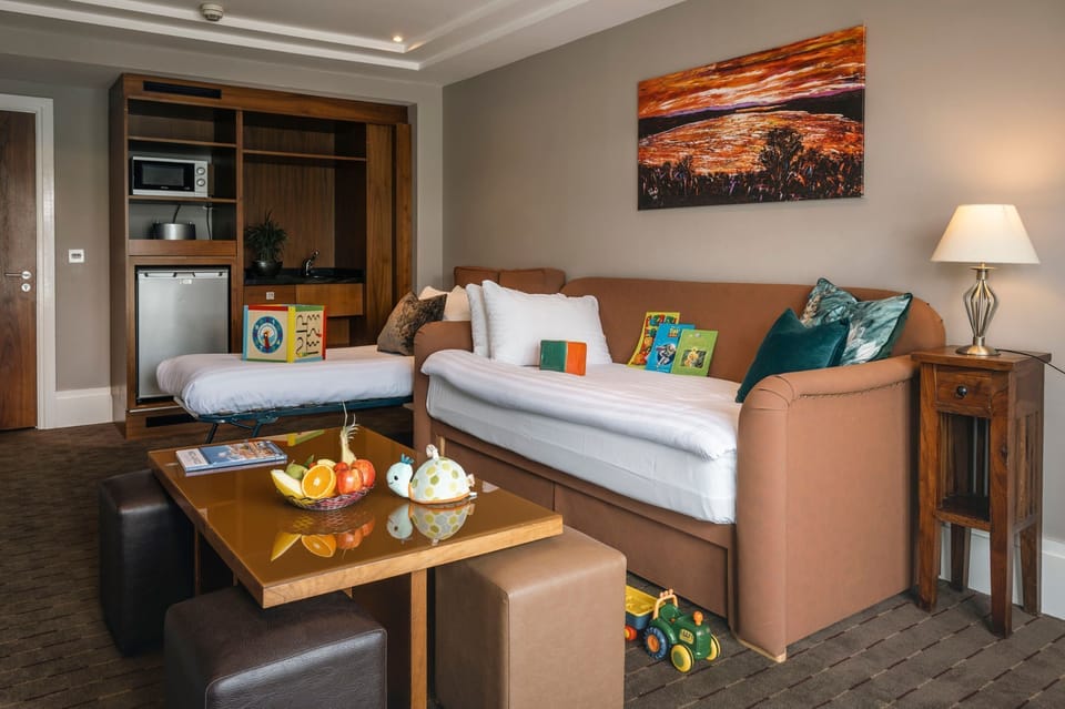 Suite, 1 Bedroom | In-room safe, desk, iron/ironing board, WiFi (free)