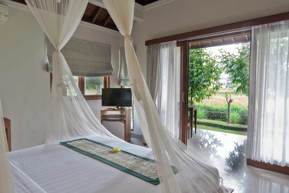 Deluxe Room | Premium bedding, minibar, in-room safe, desk