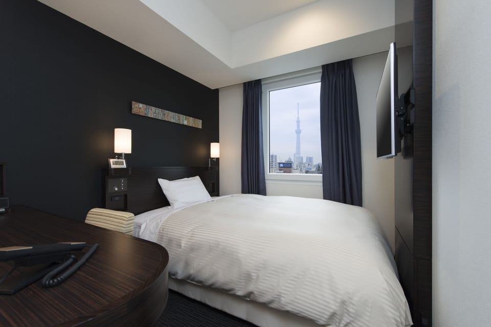 Down comforters, pillowtop beds, in-room safe, desk