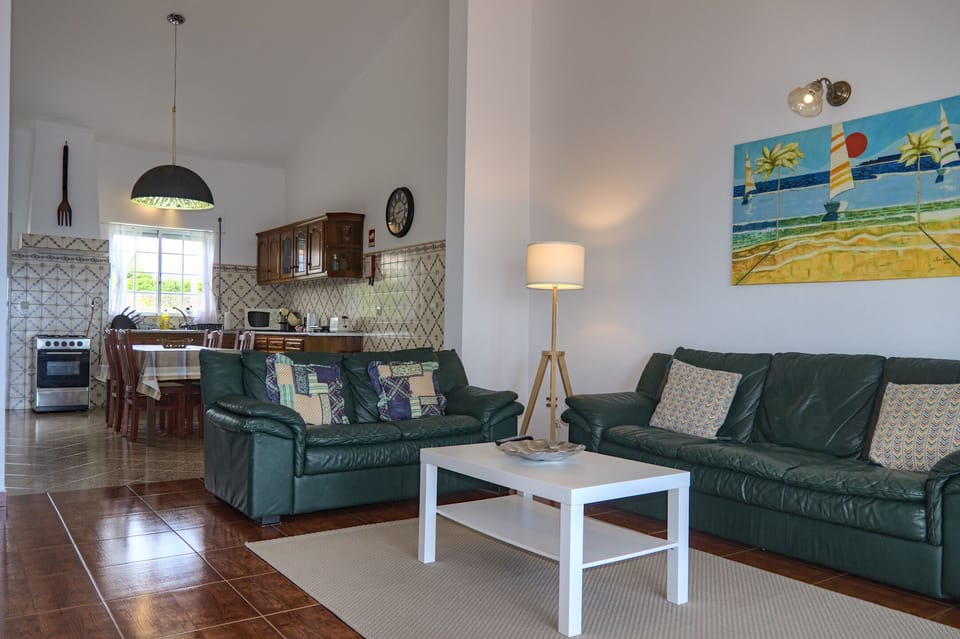 Family Apartment, 2 Bedrooms, Sea View, Beachfront | Living area | 32-inch LED TV with cable channels, TV