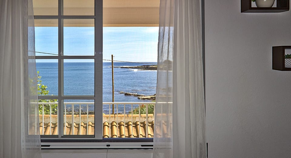 Family Apartment, 2 Bedrooms, Sea View, Beachfront | 2 bedrooms, iron/ironing board, free cribs/infant beds, free WiFi