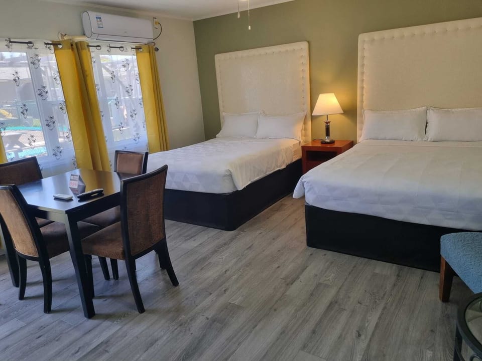 Family Room, 2 Double Beds | WiFi (free), bed sheets