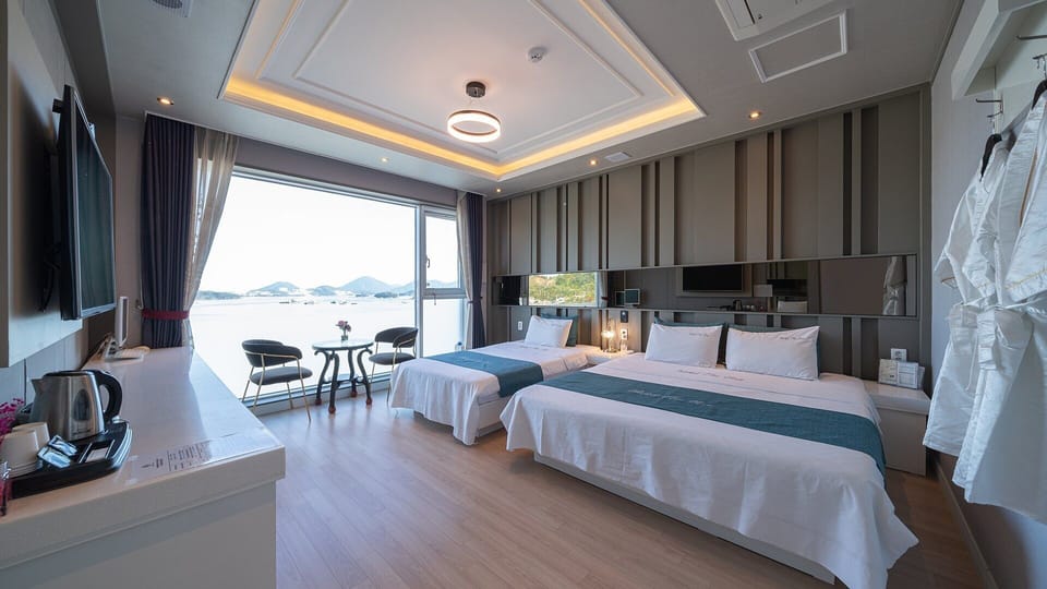 Family Twin Room, Harbor View | Down comforters, blackout drapes, free WiFi, bed sheets