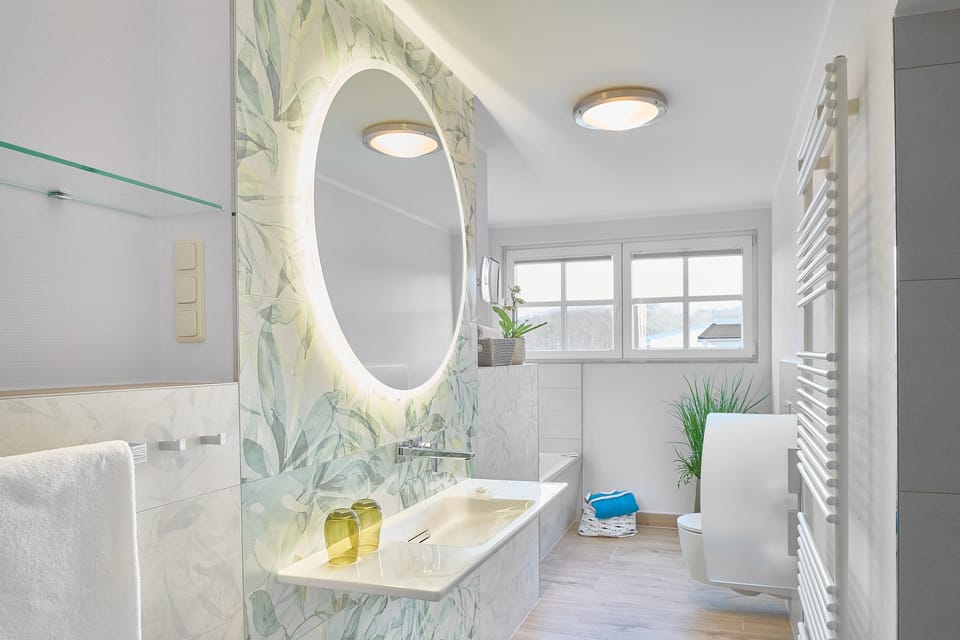 Junior Suite, Balcony, Sea View | Bathroom | Separate tub and shower, free toiletries, hair dryer, bathrobes