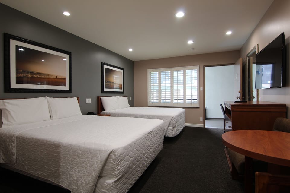 Standard Room, 2 Queen Beds | Iron/ironing board, free WiFi, bed sheets
