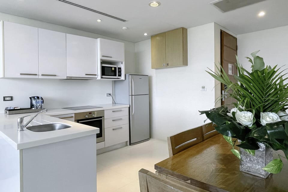 1 Bedroom Residence with Kitchen and Balcony | Private kitchenette | Fridge, microwave, electric kettle, cleaning supplies