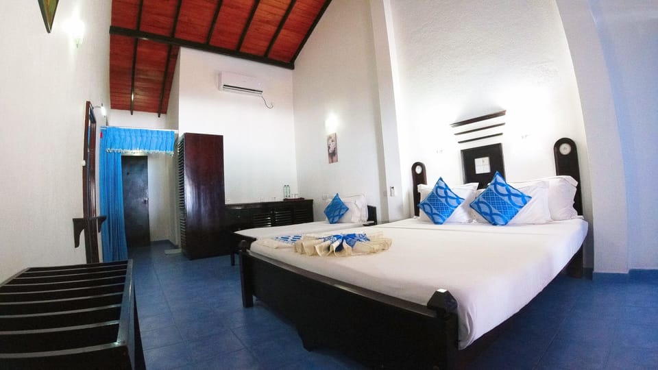 Standard Triple Room | In-room safe, desk, iron/ironing board, free WiFi