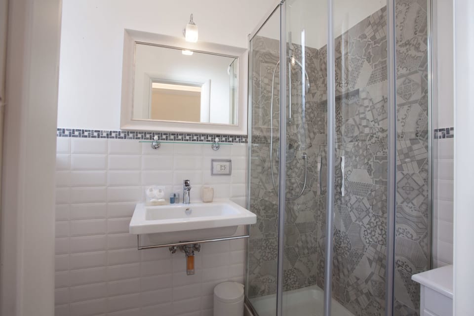 Double Room, Balcony | Bathroom | Shower, hair dryer, bathrobes, towels