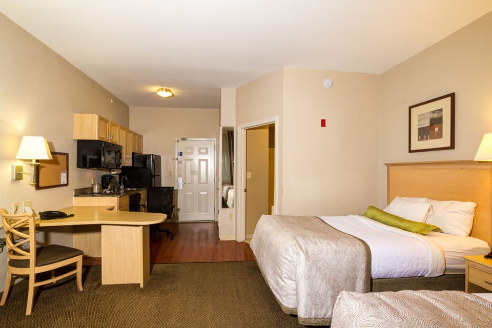 Studio Suite, 2 Double Beds | In-room safe, desk, iron/ironing board, free WiFi