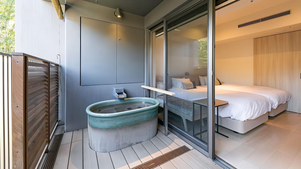 Twin Room, Non Smoking (Casual,with Open-Air Bath) | Bathroom | Free toiletries, hair dryer, slippers, bidet
