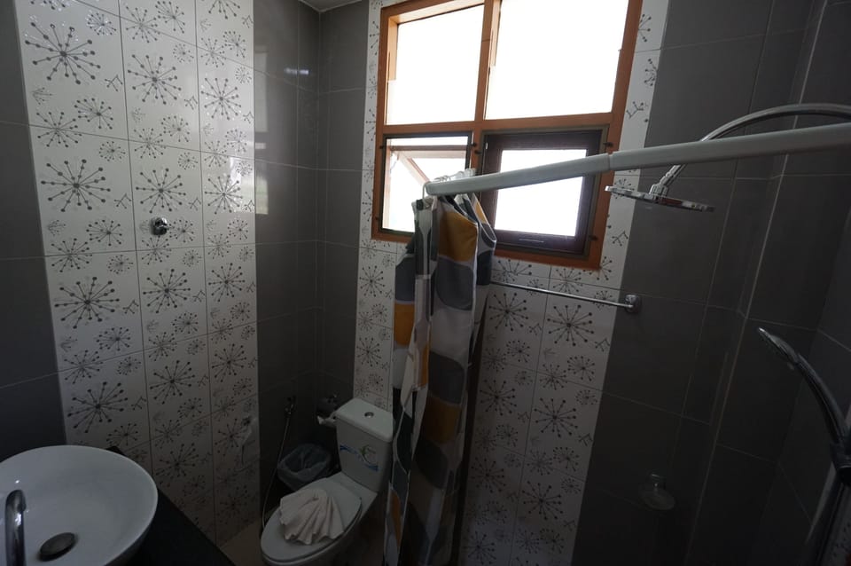 Standard Double Room, Air Conditioned | Bathroom | Shower, free toiletries, hair dryer, towels