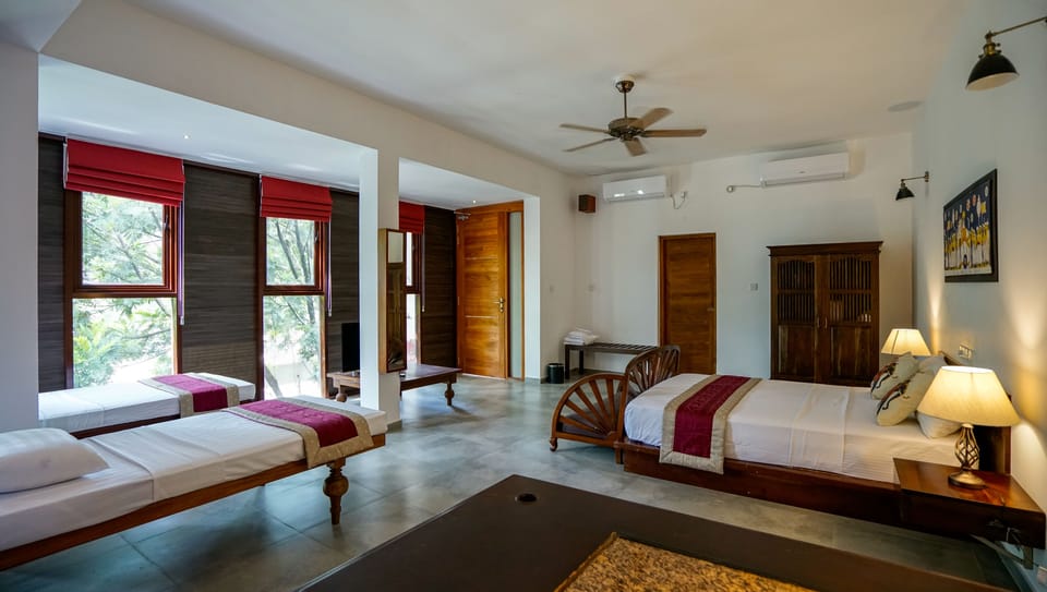 The Signature Suite, 1 King Bed, 3 single Beds, Non Smoking, Mountain View | In-room safe, individually decorated, individually furnished, desk