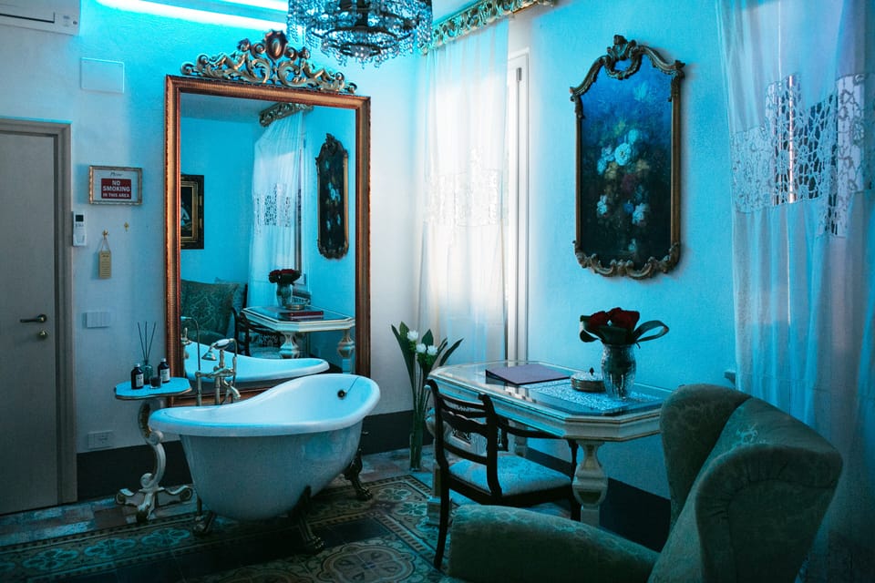 Romantic Suite, 1 King Bed with Sofa bed, Non Smoking, City View | Living area | 32-inch LED TV with satellite channels, TV