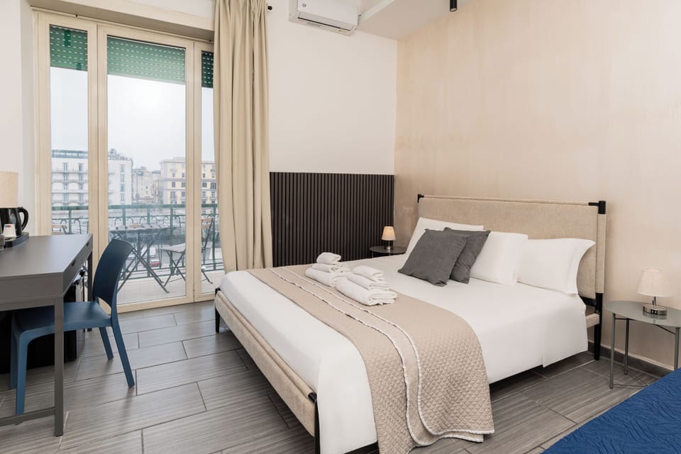 Triple Room, City View | In-room safe, desk, soundproofing, free WiFi