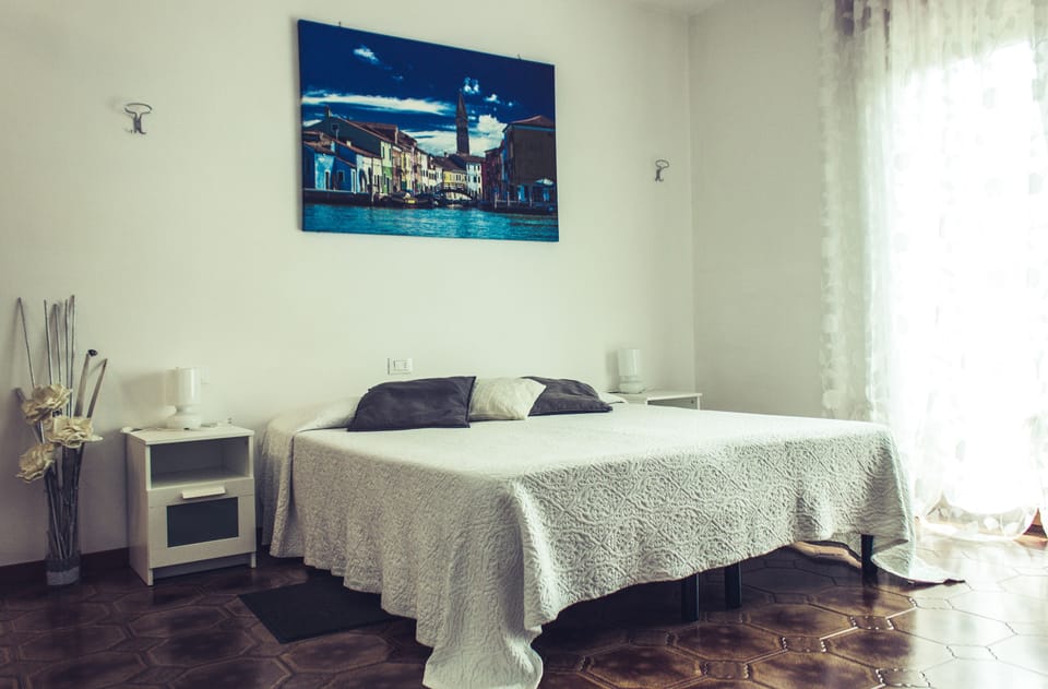 Standard Quadruple Room, Private Bathroom | Desk, iron/ironing board (on request), WiFi (free), bed sheets