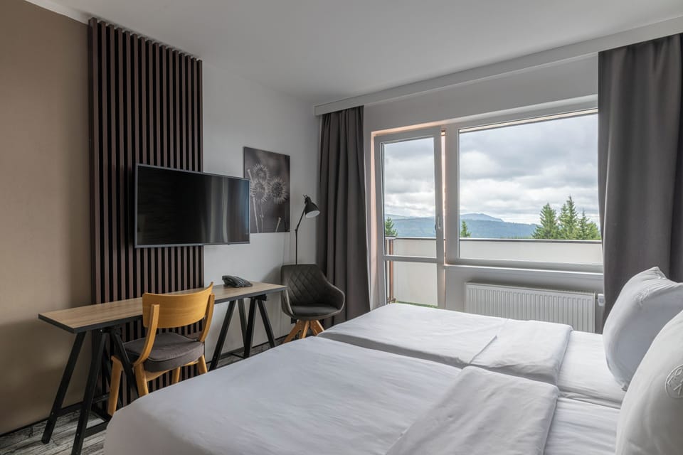 Executive Double Room, Balcony (PLUS) | Desk, blackout drapes, iron/ironing board, free WiFi