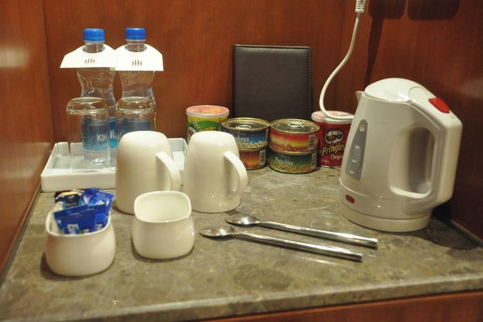 In-room safe, desk, laptop workspace, iron/ironing board