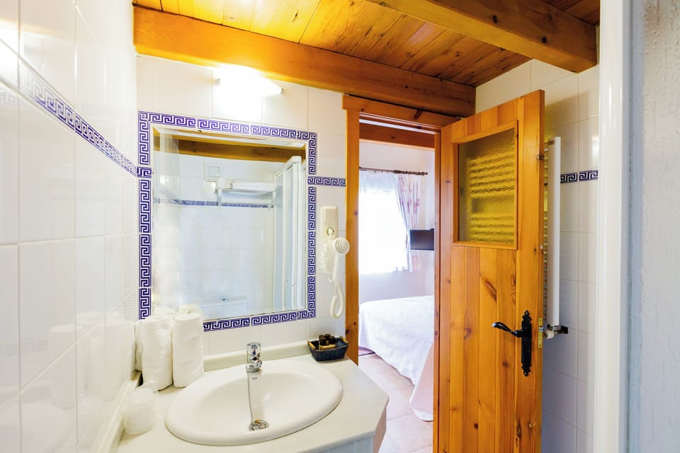 Panoramic Double Room, Pool Access, Valley View | Bathroom | Combined shower/tub, free toiletries, hair dryer, towels
