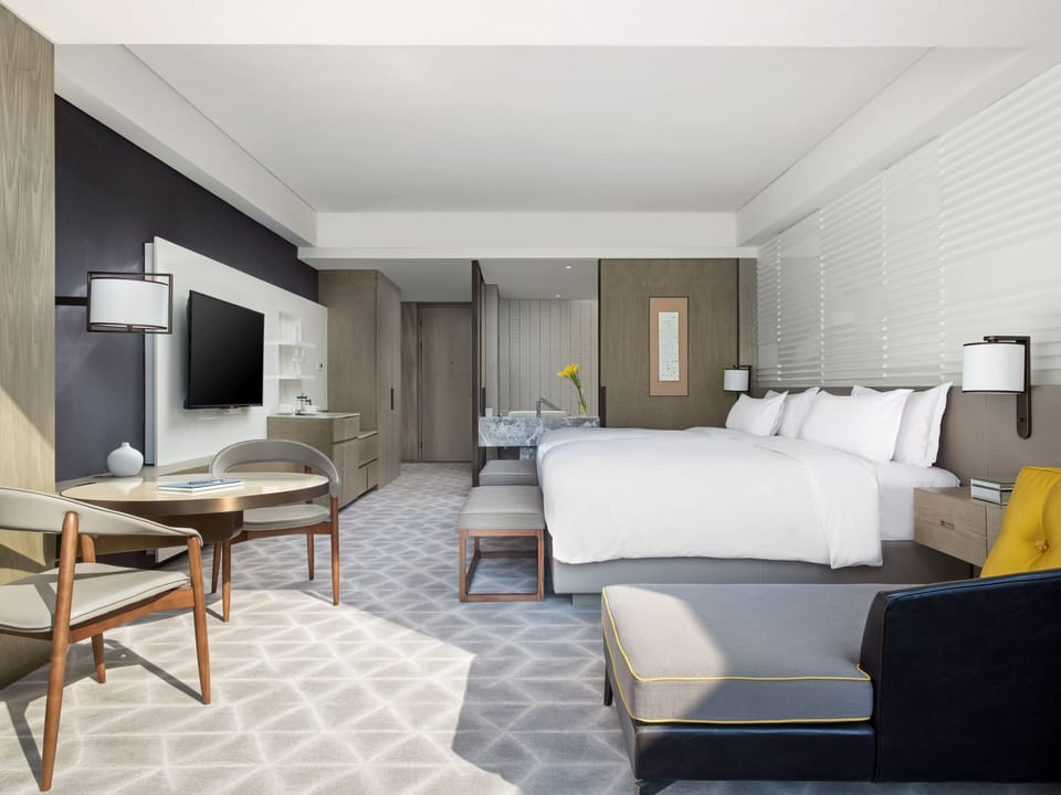 Deluxe Terrace | Down comforters, minibar, in-room safe, individually decorated