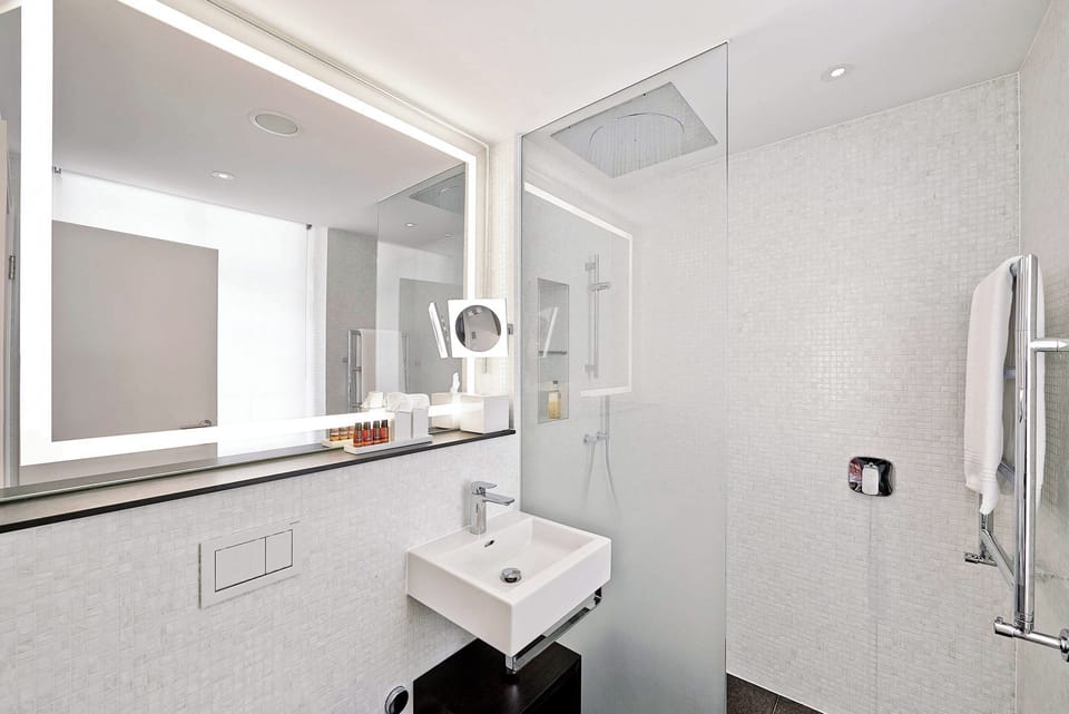 Rainfall showerhead, free toiletries, hair dryer, towels