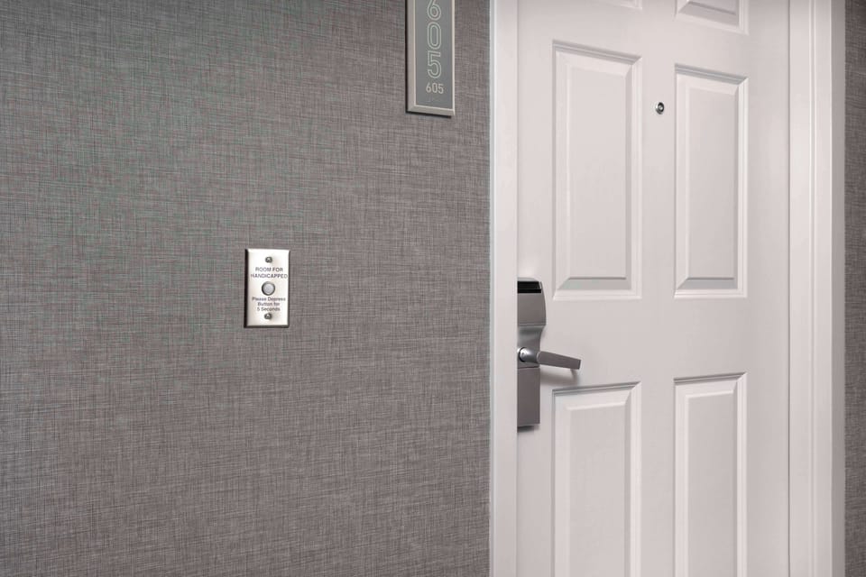 Premium bedding, blackout drapes, iron/ironing board