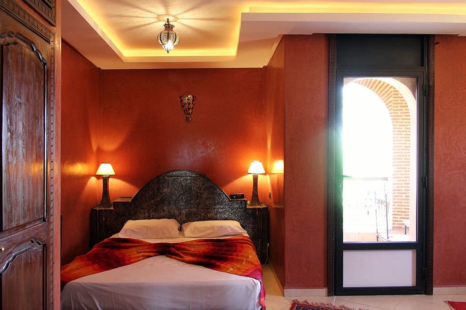 Junior Double Room, Pool View (Noura) | Minibar, in-room safe, iron/ironing board, free WiFi
