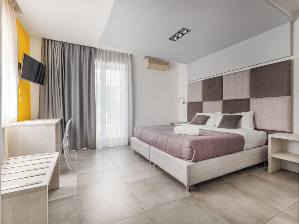 Deluxe Double Room | Premium bedding, minibar, desk, laptop workspace