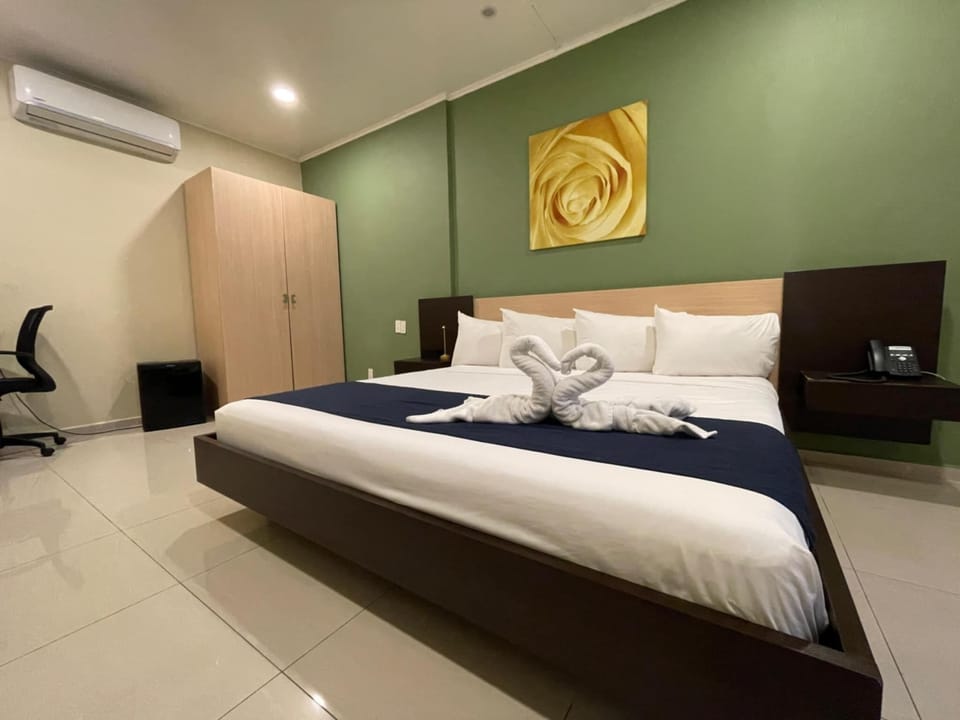 Room, 1 King Bed, No Windows | Desk, laptop workspace, iron/ironing board, free WiFi