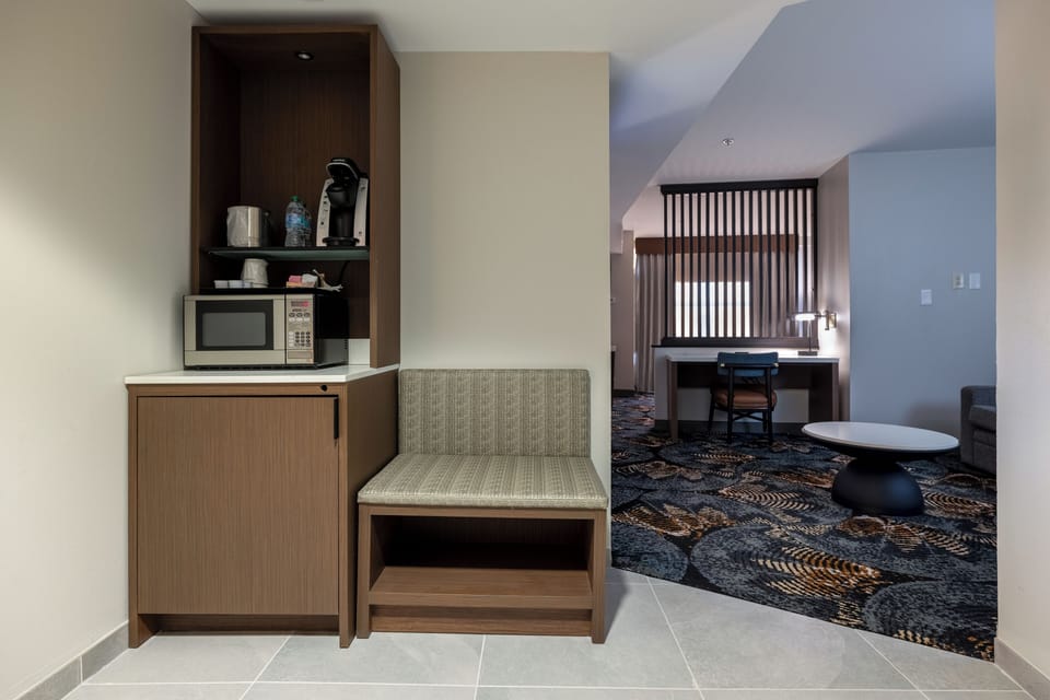 Junior Suite | Living area | 55-inch LCD TV with cable channels, TV