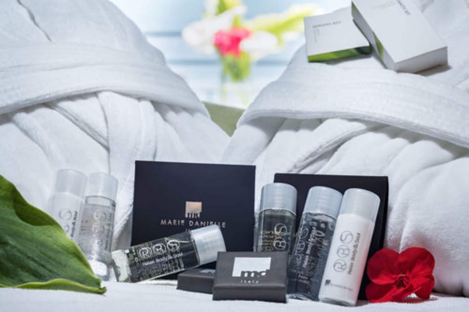 Premium bedding, down comforters, memory foam beds, in-room safe