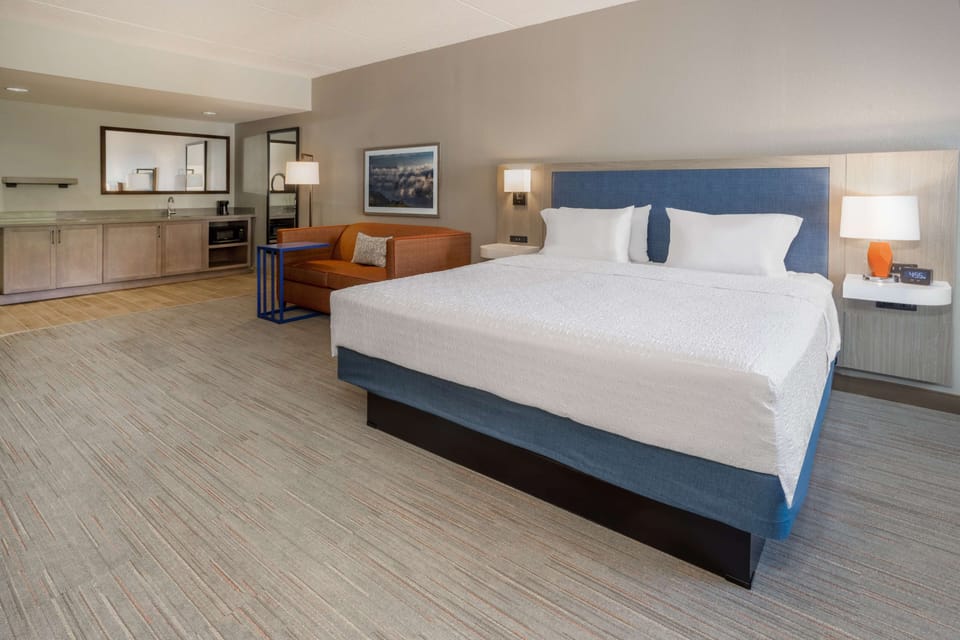 One King Bed Studio | Living area | 55-inch LCD TV with cable channels, TV, pay movies