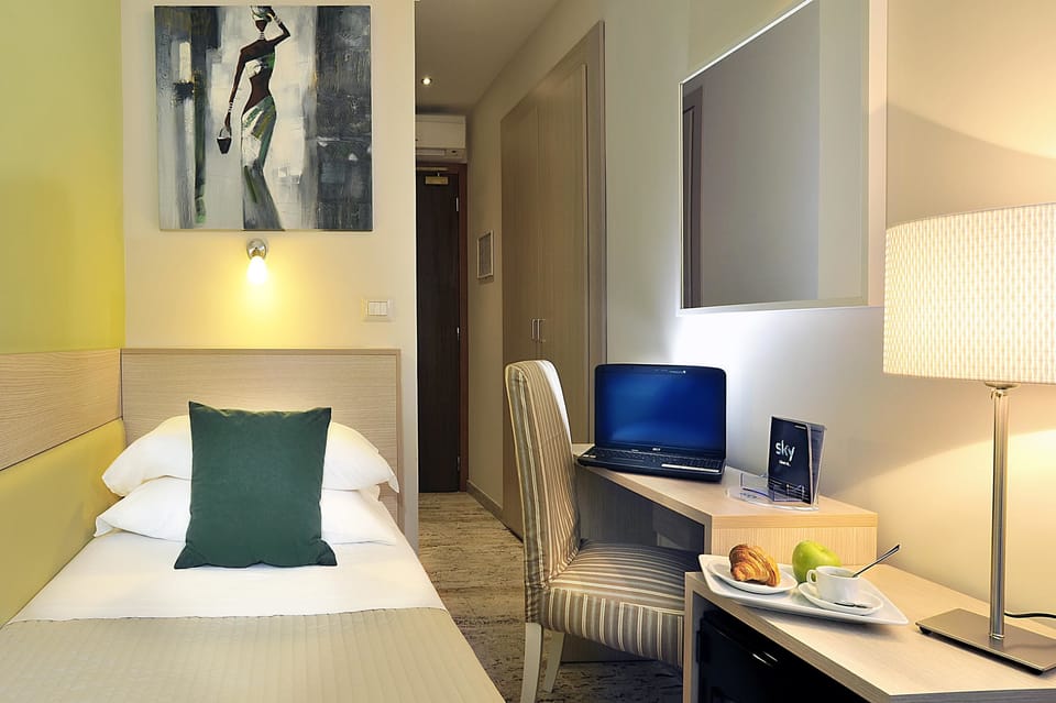Select Comfort beds, minibar, in-room safe, desk