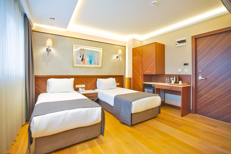 Egyptian cotton sheets, premium bedding, minibar, in-room safe
